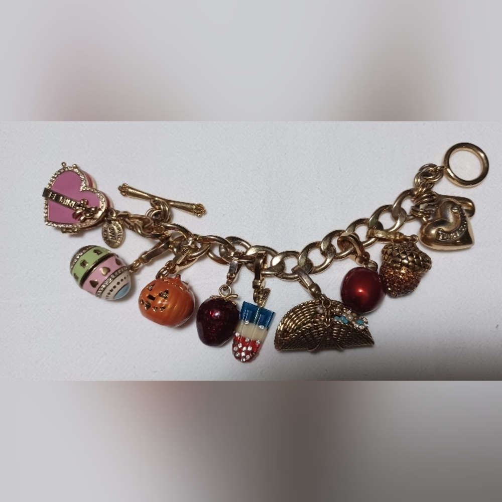 Gold and Red Charm Bracelet with Intricate Fan Design